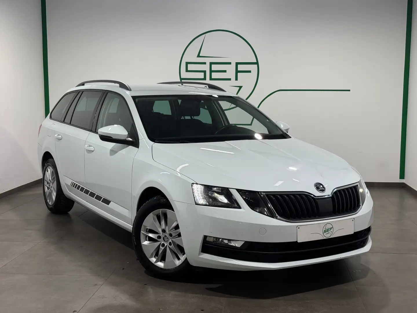 Skoda Octavia ** SW ** 2.0 TDi ** GPS ** Garantie 12 mois ** Wit - 1