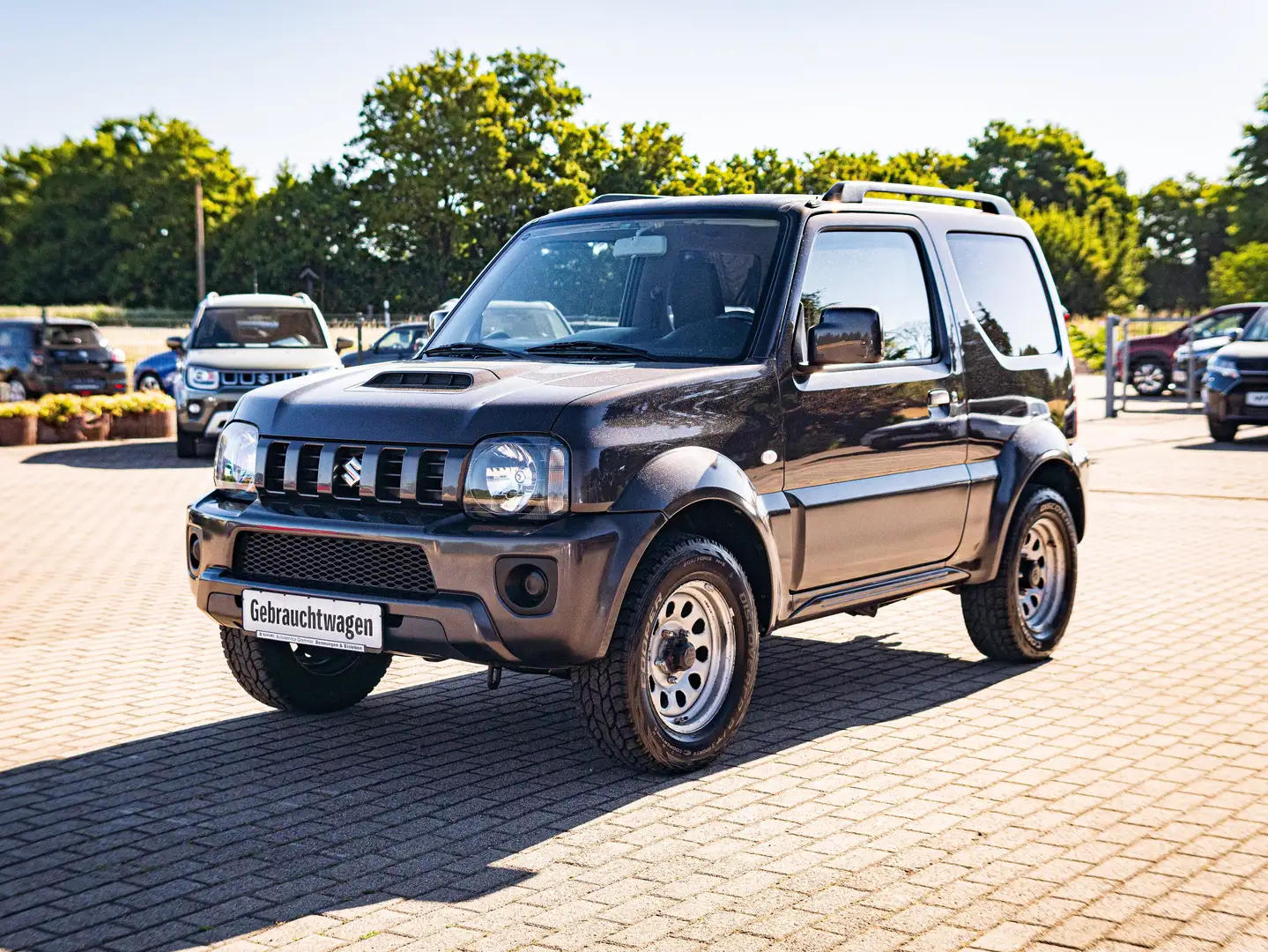 Suzuki Jimny Comfort *AHVZ *ALL-TERRAIN-REIFEN *LADERAUMWANNE Grijs - 1