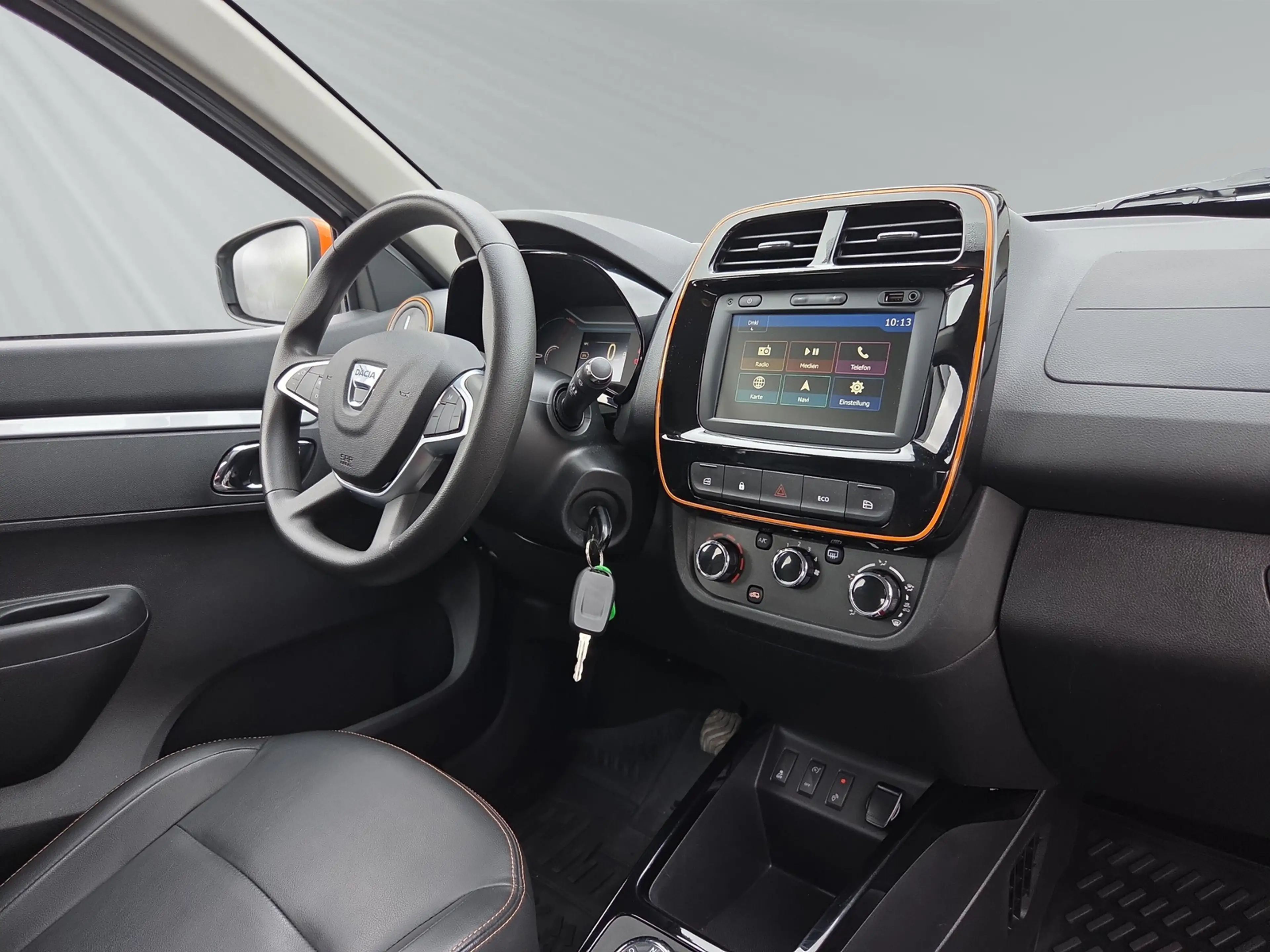 Dacia Spring Electric 45 Comfort Plus look Paket orange — photo 11
