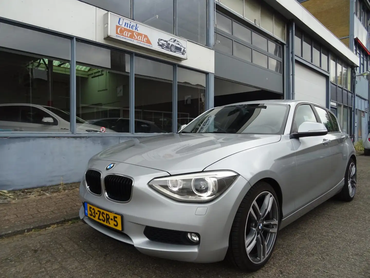 BMW 114 1-serie 114i EDE Business+ Grijs - 1