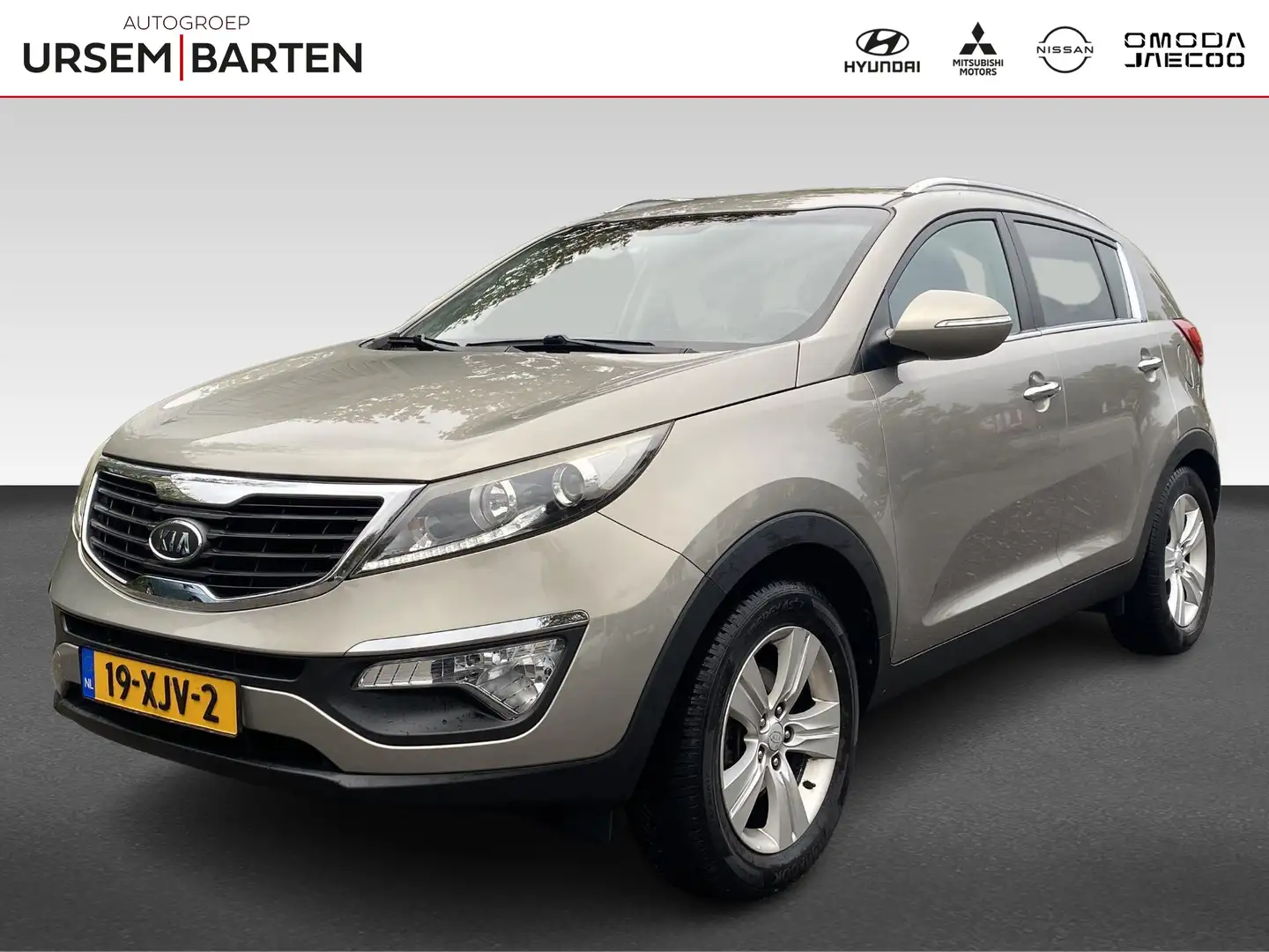 Kia Sportage 2.0 X-ecutive Plus Pack | All season banden Gris - 1