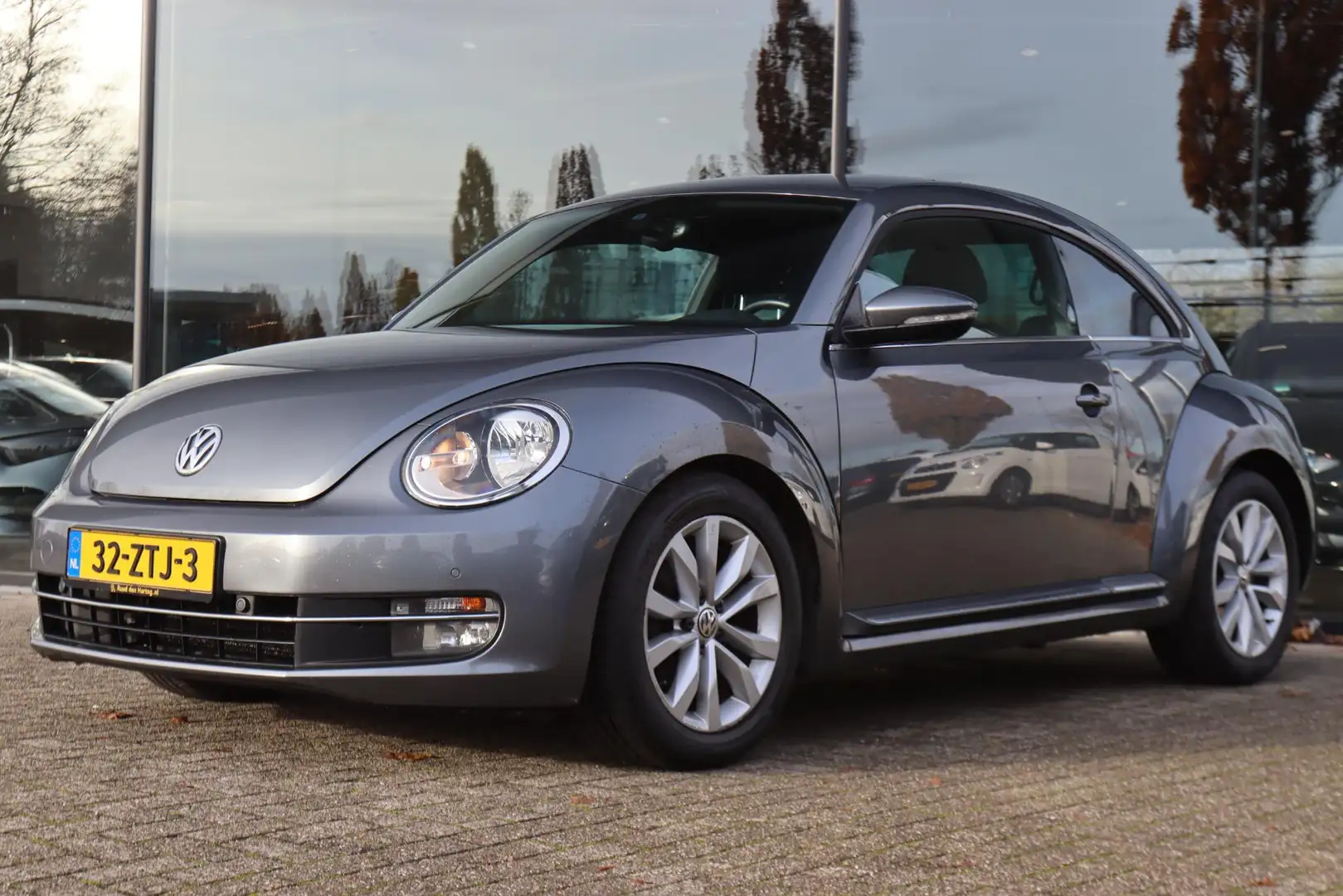 Volkswagen Beetle 1.2 TSI DESIGN | CRUISE | NAVI | CLIMATE | PDC Grijs - 1