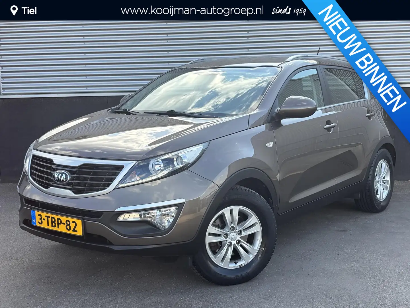 Kia Sportage 1.6 GDI Vibe Trekhaak, Navigatie, Climate control, Bruin - 1