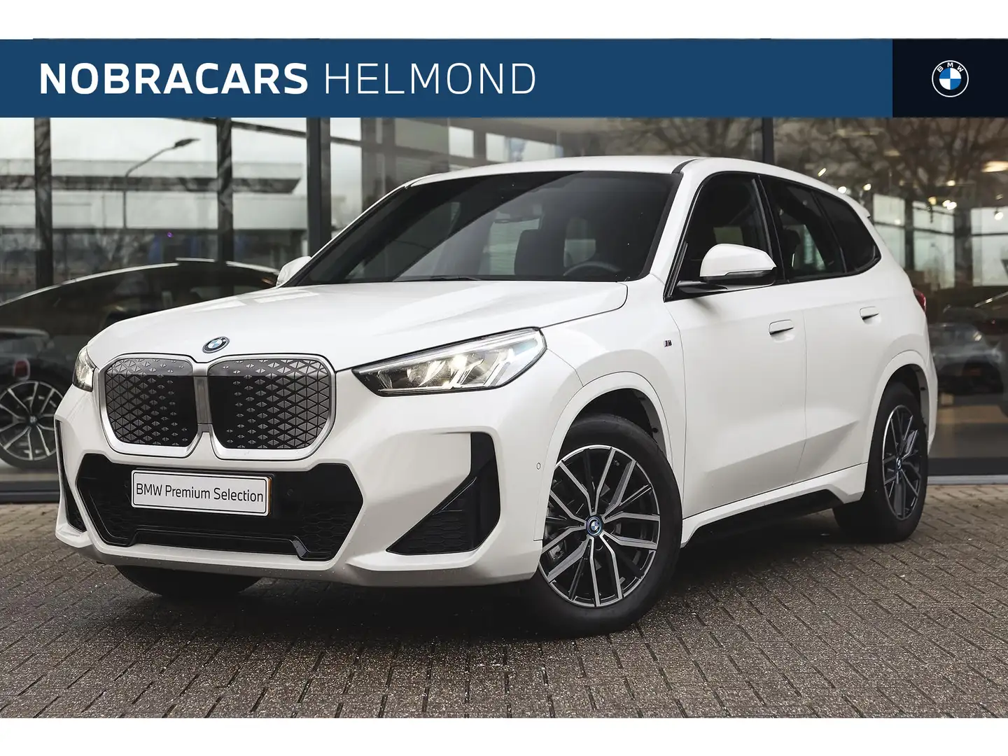 BMW iX1 eDrive20 M Sport / Sportstoelen / M Adaptief onder Blanc - 1