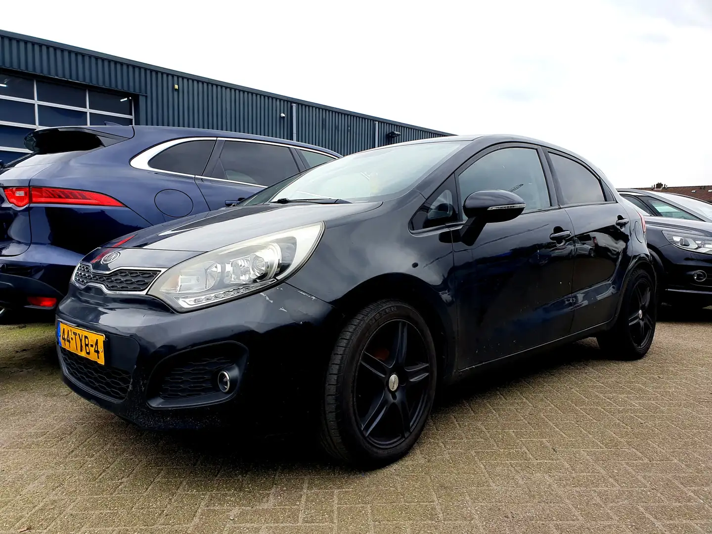 Kia Rio 1.1 CRDi Plus Pack - Motorschade Negro - 1