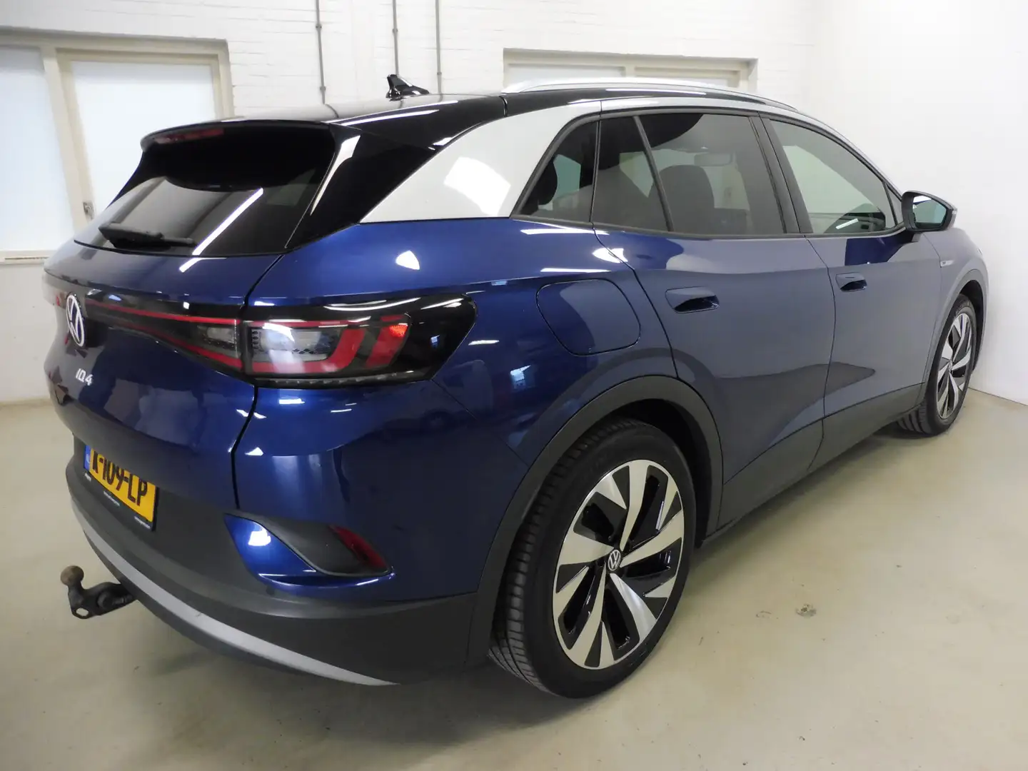 Volkswagen ID.4 First 77 kWh S.O.H. 93% Camera | Elec. trekhaak  | Blauw - 2
