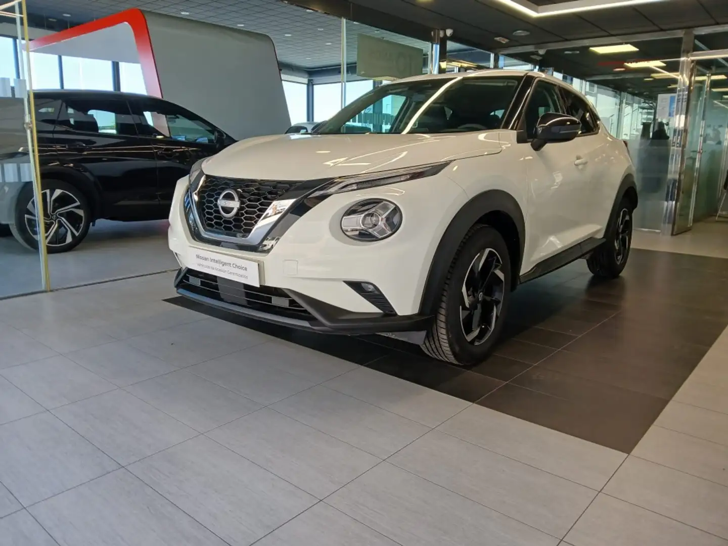 Nissan Juke 1.0 DIG-T Acenta 4x2 114 Bianco - 1