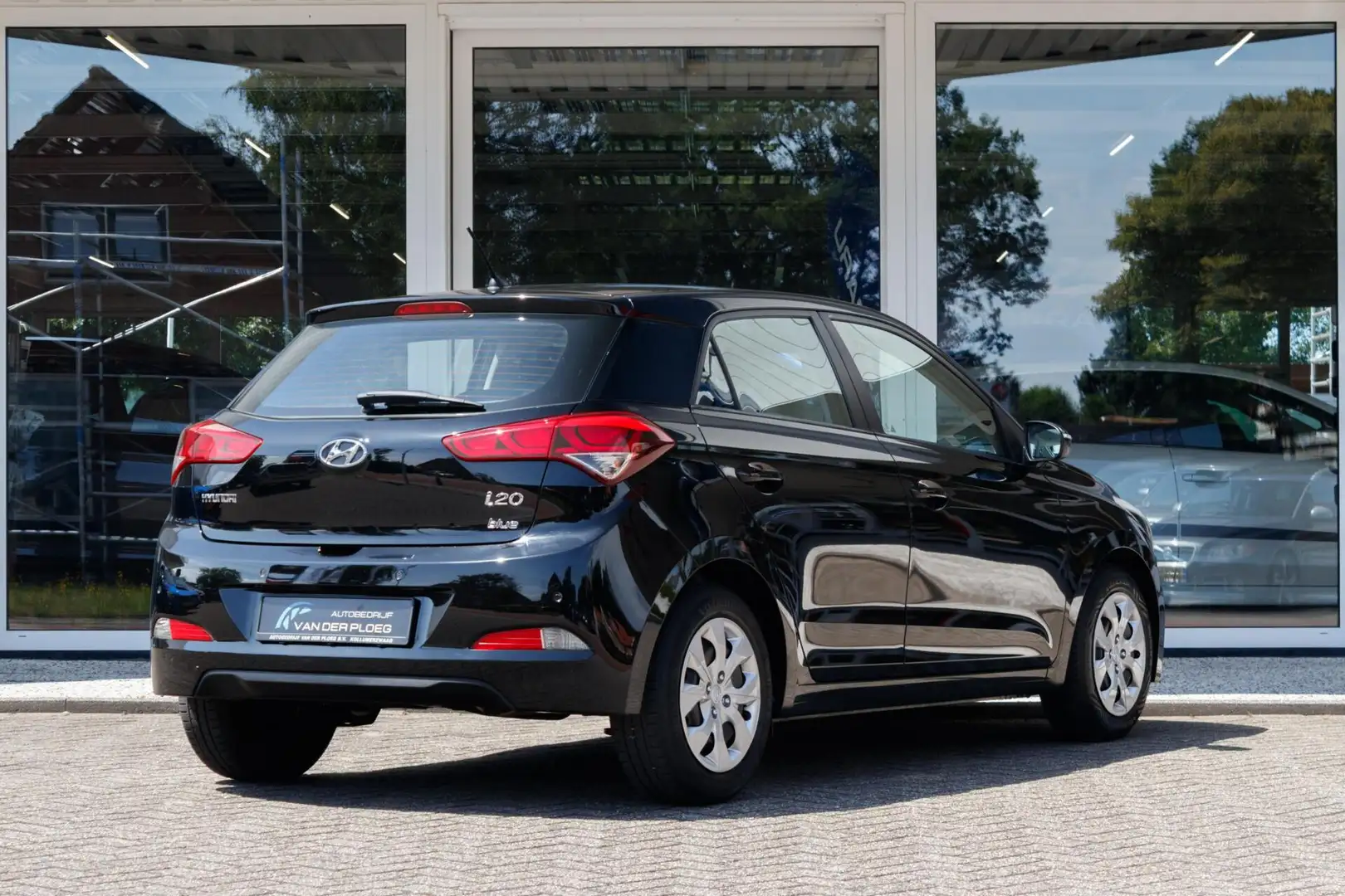 Hyundai i20 1.2 HP i-Motion | Airco | Cruise control | Parkeer Zwart - 2