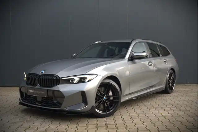 BMW 330 3-serie Touring 330i xDrive High Excecutive M Spor
