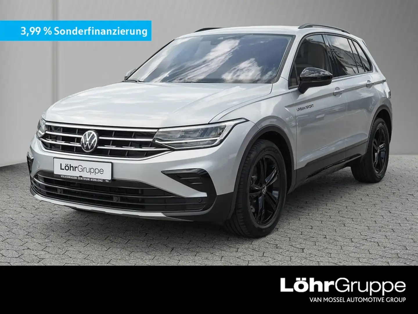 Volkswagen Tiguan 2.0 TSI DSG Urban Sport 4Mo AHK/Navi/RFK Silber - 1