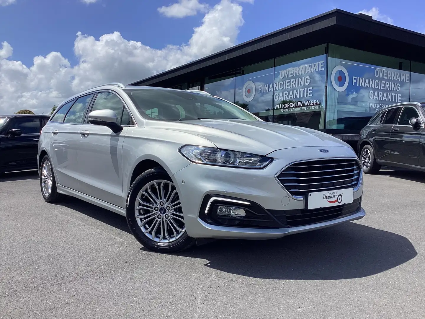 Ford Mondeo 2.0TDCi/1steEig/67000km/Leder/Cam&Pdc/LED/Trekhaak Zilver - 1