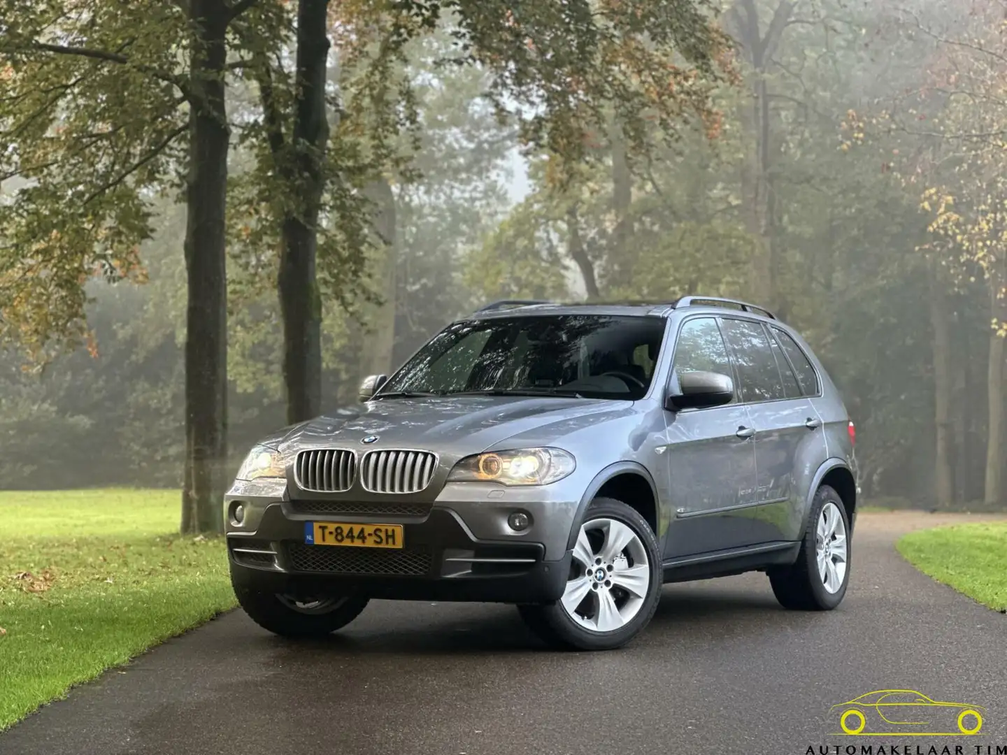 BMW X5 xDrive48i High Executive / 7 persoons / Youngtimer Grijs - 1