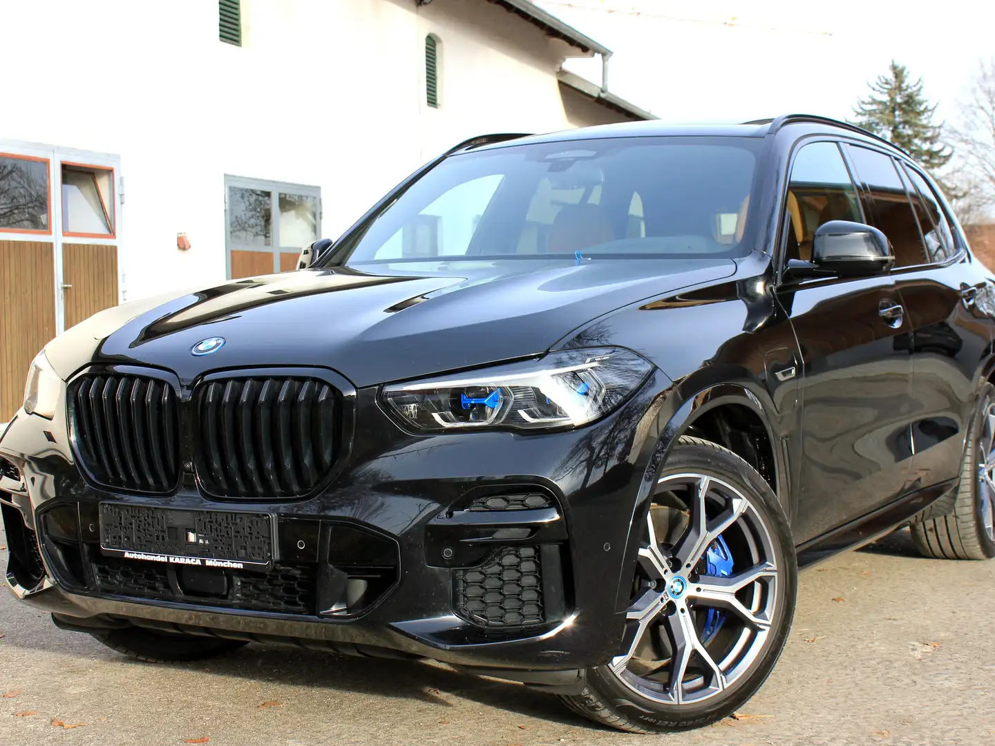 BMW X5 xDrive 45e M Sport Pano AHK Laser VOLL 1.Hand 21" Schwarz - 1