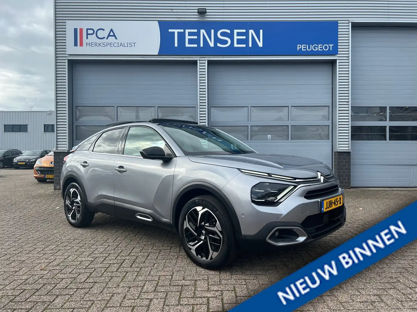 Citroen C4 1.2 130PK Shine | Automaat | Navigatie | Opendak | Grijs - 1