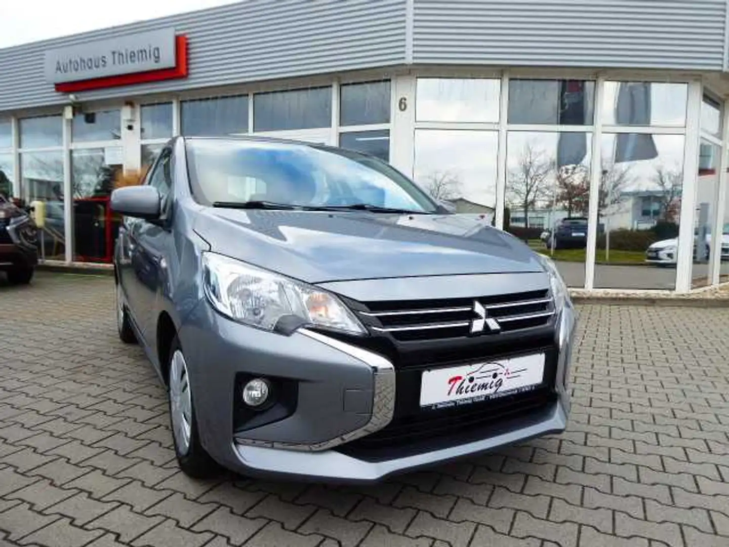 Mitsubishi Space Star Spirit 1.2 MIVEC 5-Gang Grijs - 1