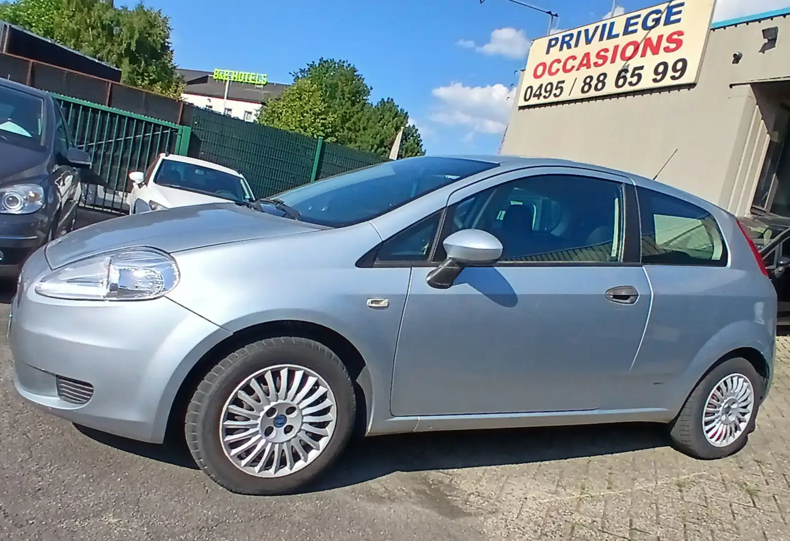Fiat Grande Punto AUTOMATiQUE 1.4i 8v Active dir ass vc vtel rcd Gris - 1