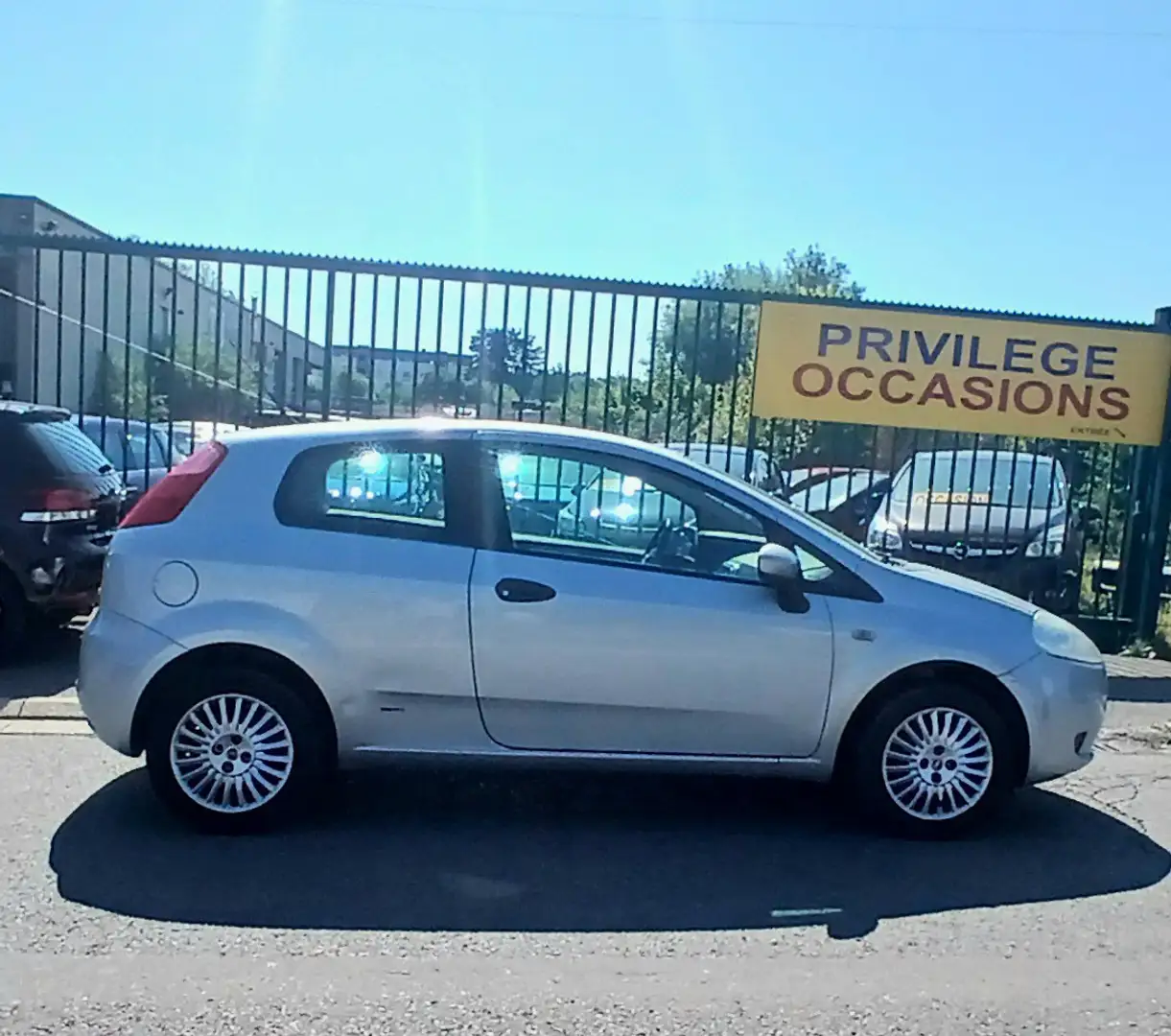 Fiat Grande Punto AUTOMATiQUE 1.4i 8v Active dir ass vc vtel rcd Grijs - 1