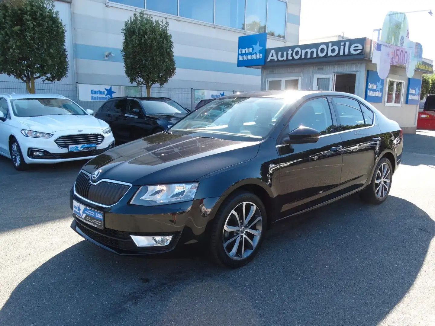 Skoda Octavia Lim.**Edition**1.6Tdi*Navi*SHZ*AHK*1Hand Schwarz - 1