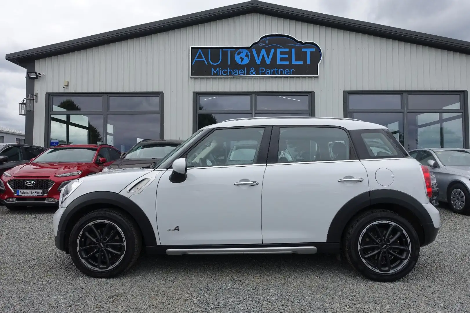 MINI Cooper Countryman ALL4 1.6 T Aut.NAVI XEN PDC 17 Weiß - 1