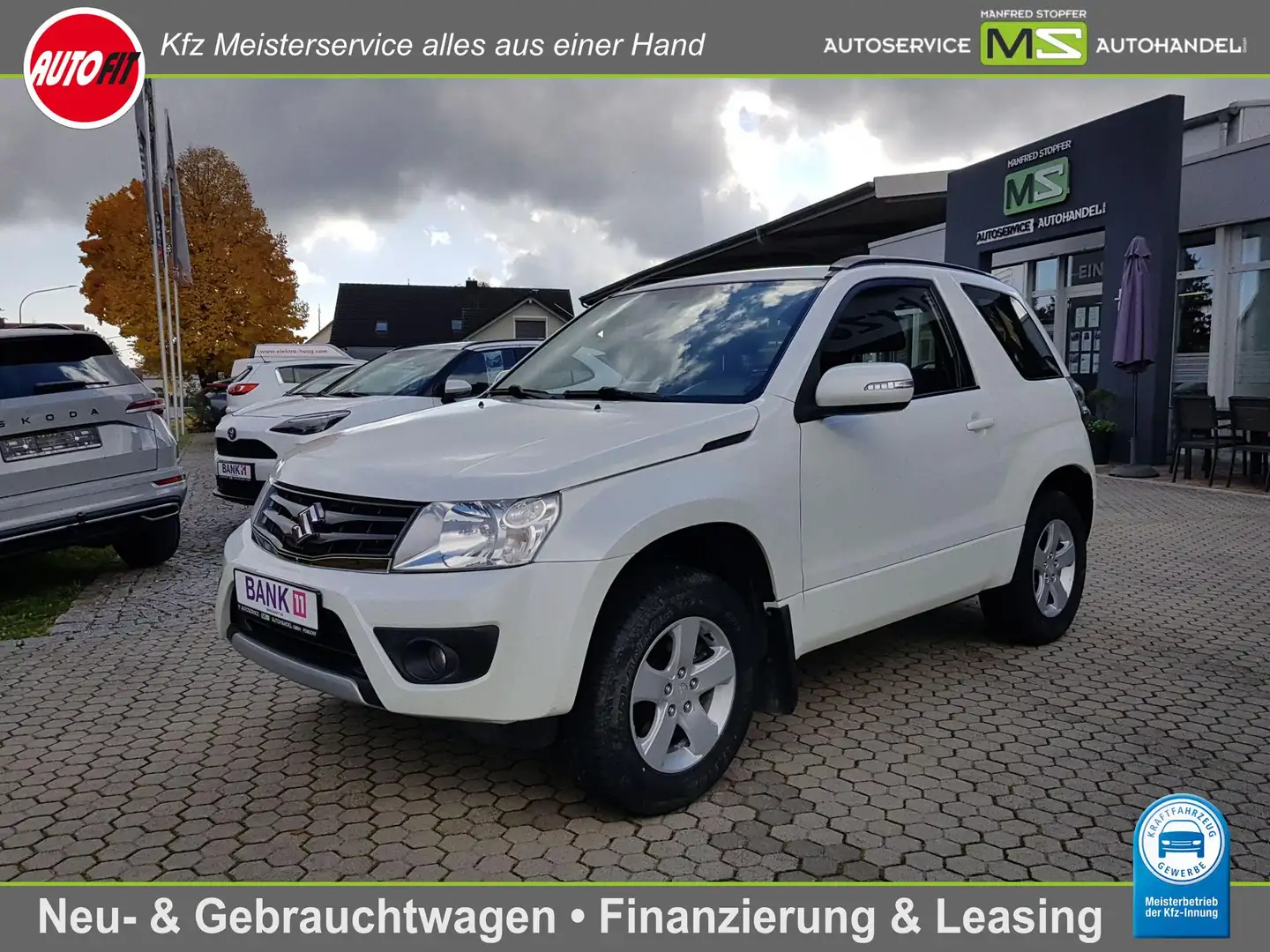 Suzuki Grand Vitara 1.6 City 4x4 ALLRAD+KLIMA+ZV+AHK+ALU+PDC+SCHECKHEF Weiß - 1