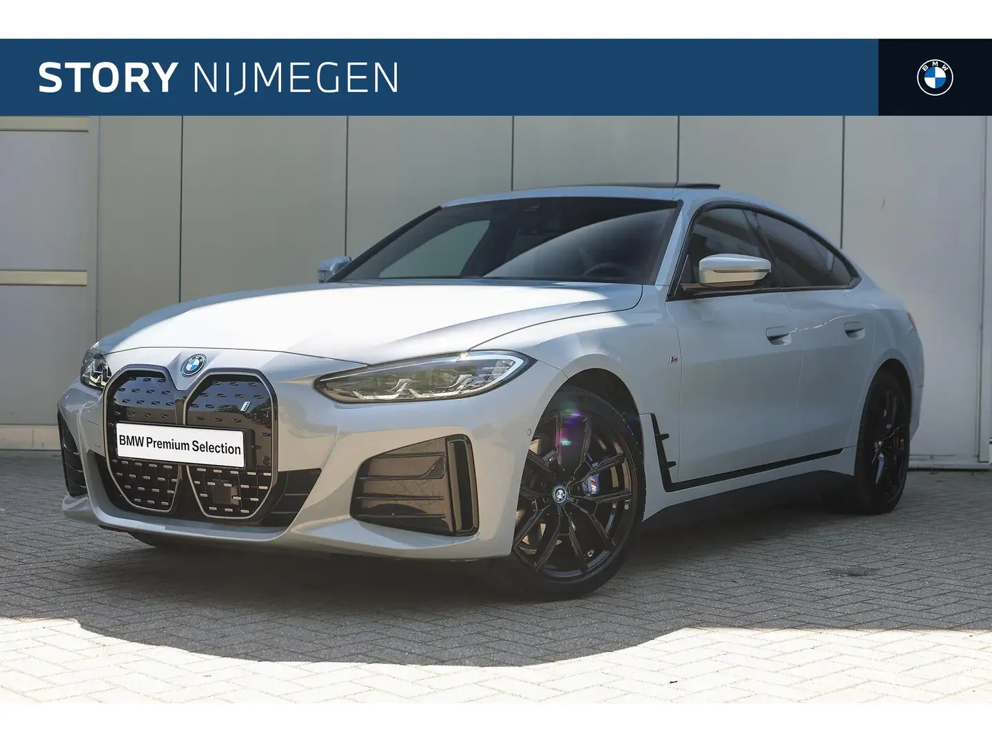 BMW i4 eDrive40 High Executive M Sport / Schuif-kanteldak Grijs - 1