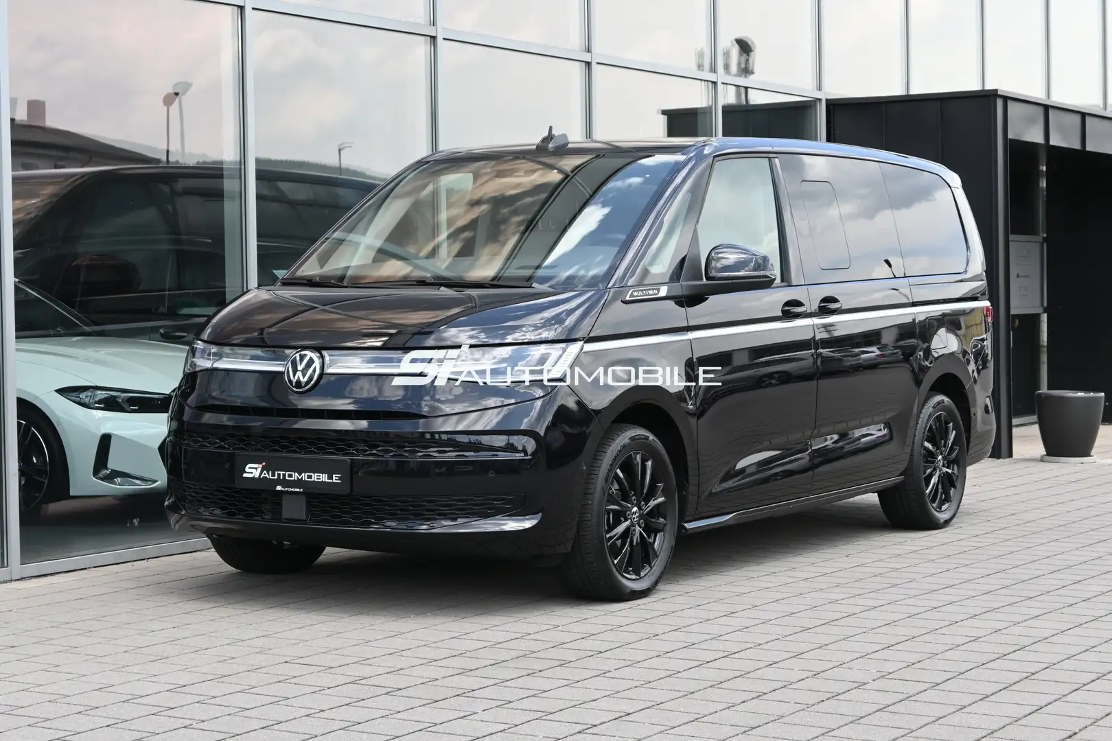 Volkswagen T7 Multivan 2.0 TDI DSG Style Lang *UVP 82.348€*AHK*MEMO*SH Schwarz - 1