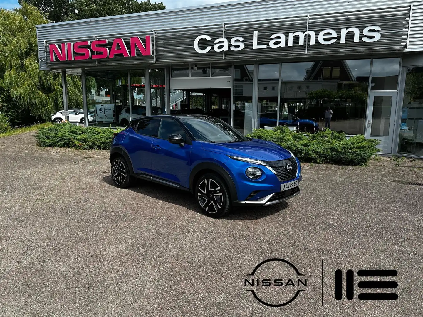 Nissan Juke Hybrid 143pk N-Design Cold & Tech pack Blauw - 1