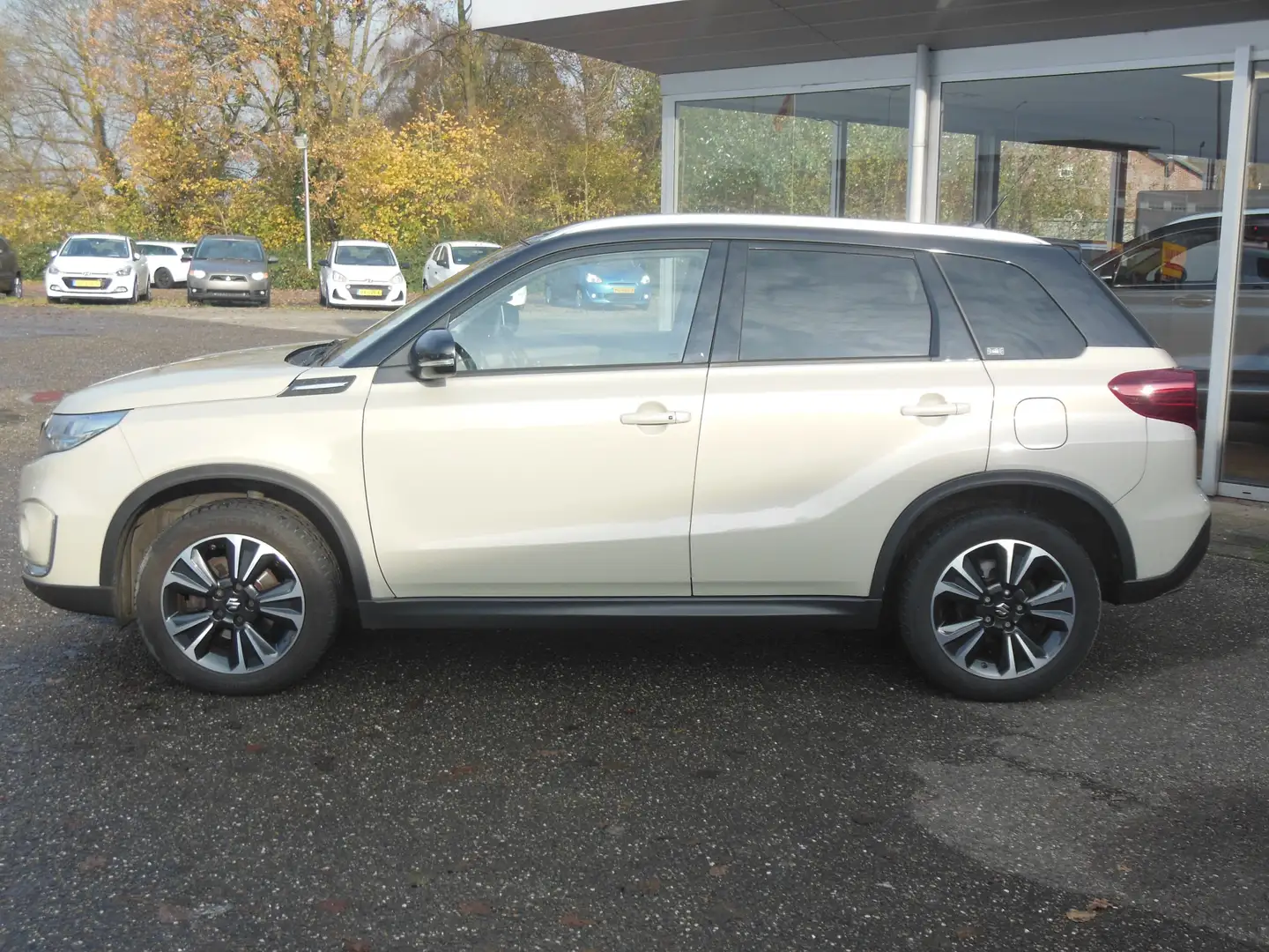 Suzuki Vitara 1.4 Boosterjet Style Smart Hybrid Staat in Hardenb Bruin - 2