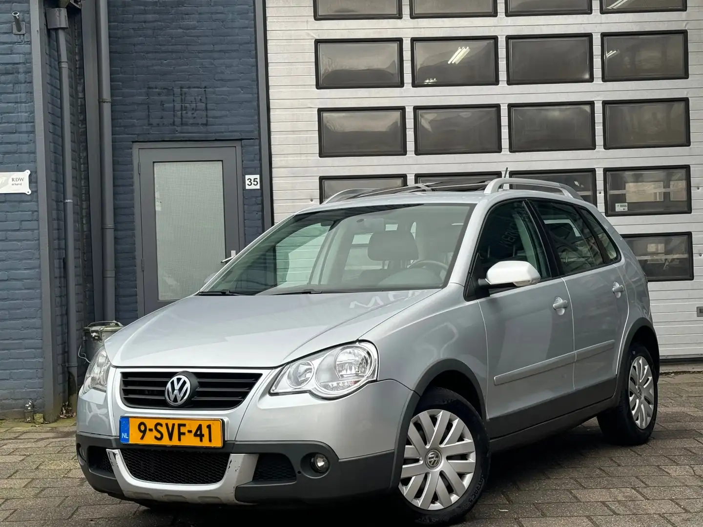 Volkswagen Polo Cross 1.4-16V | Airco | Cruise | Schuif-Dak | NW APK Gri - 1