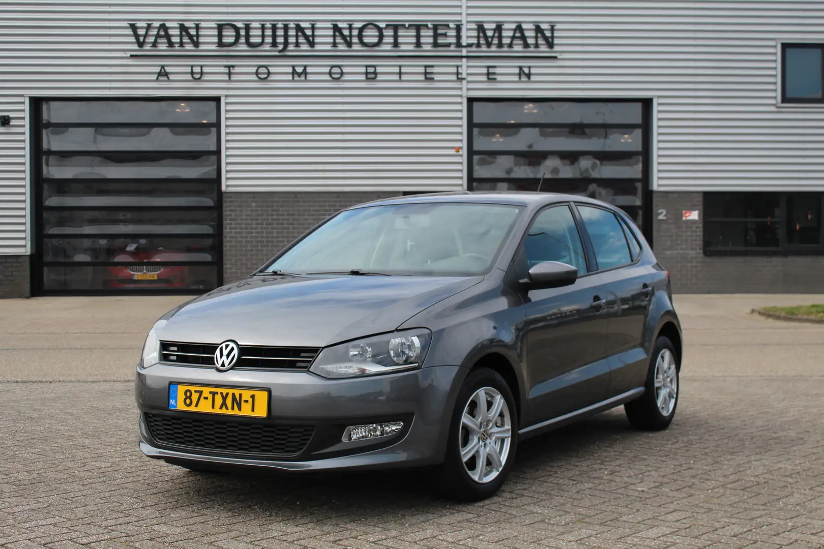 Volkswagen Polo 1.2 TSI Comfortline / Automaat / Cruise / N.A.P. Gri - 1