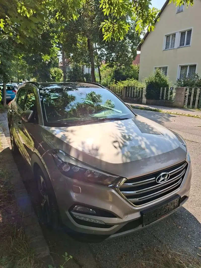 Hyundai TUCSON Tucson 2,0 CRDI 4WD Platin Aut. Platin Bronze - 1