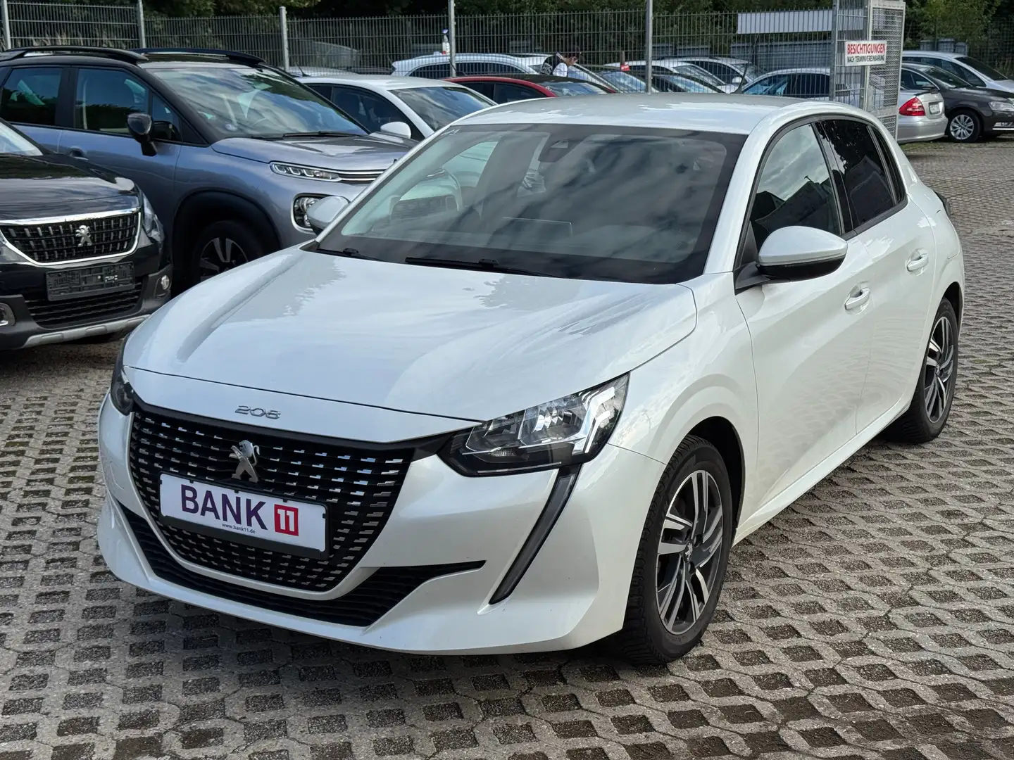 Peugeot 208 1,2i*Teilleder*1.Hand*Apple Carplay Wit - 1