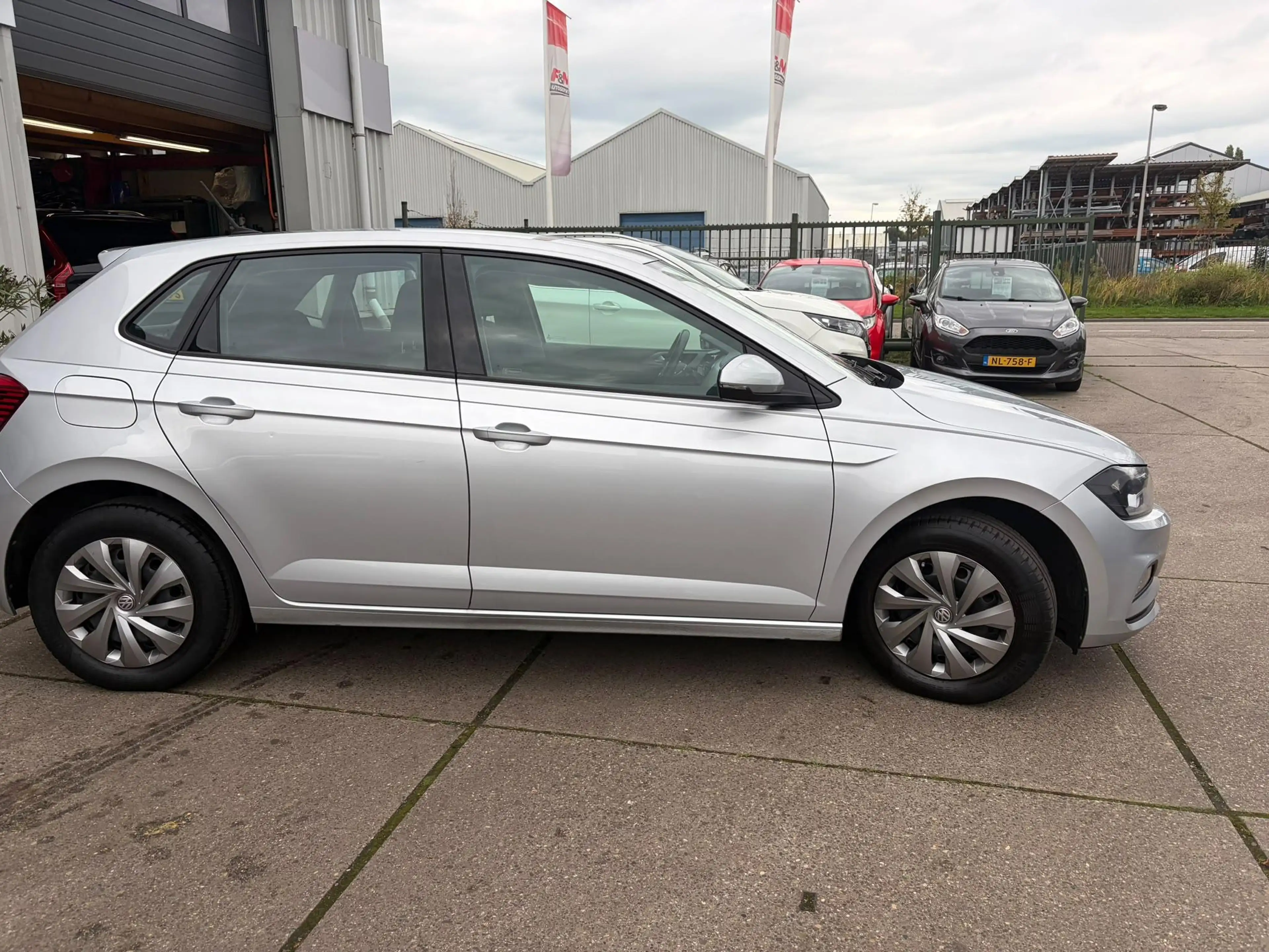 Volkswagen Polo 1.0 TSI Comfortline Business Airco, Cruise, CarPla — photo 4