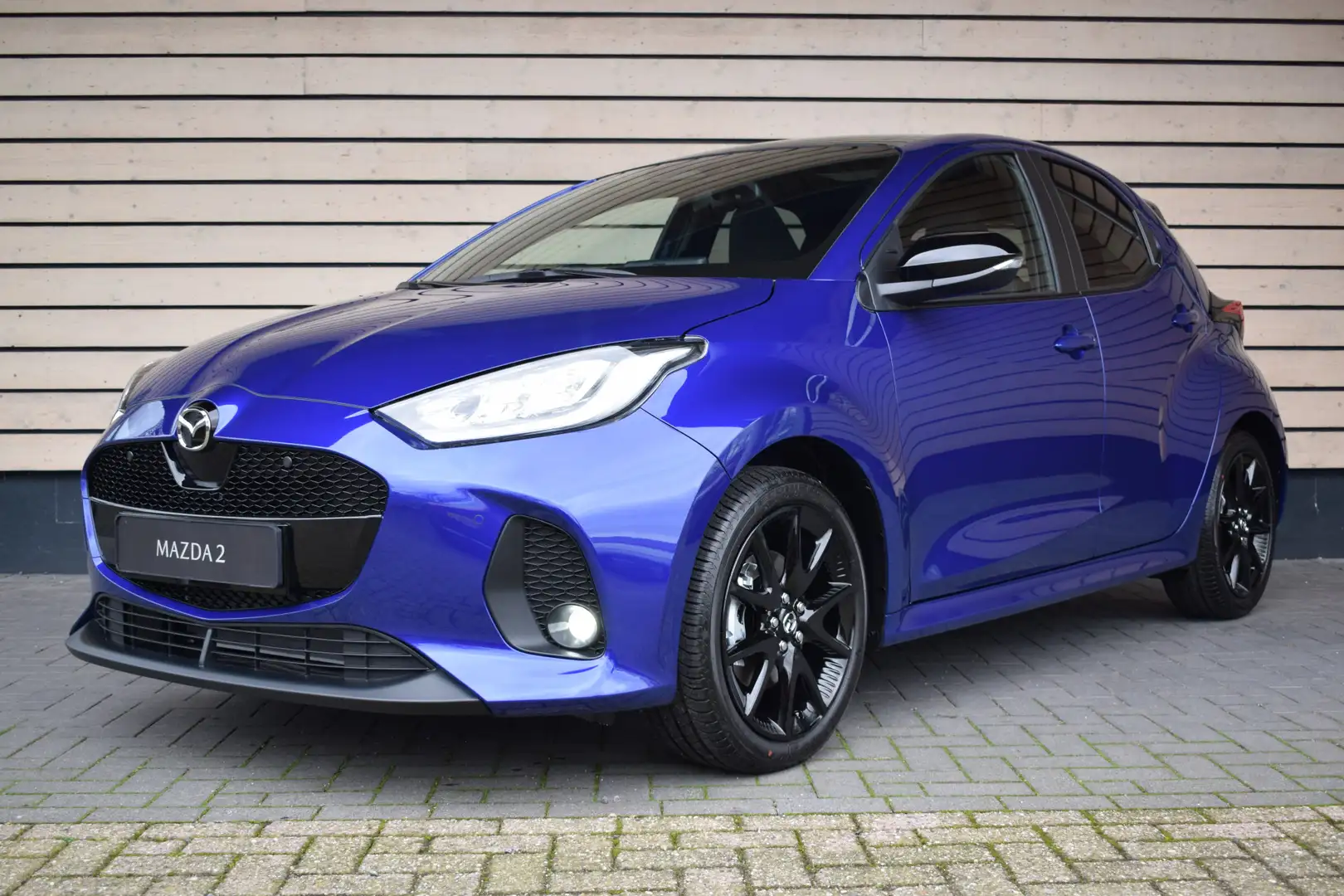 Mazda 2 Hybrid 1.5 Homura Plus - € 3.000,- Voorraad Kortin Blauw - 2
