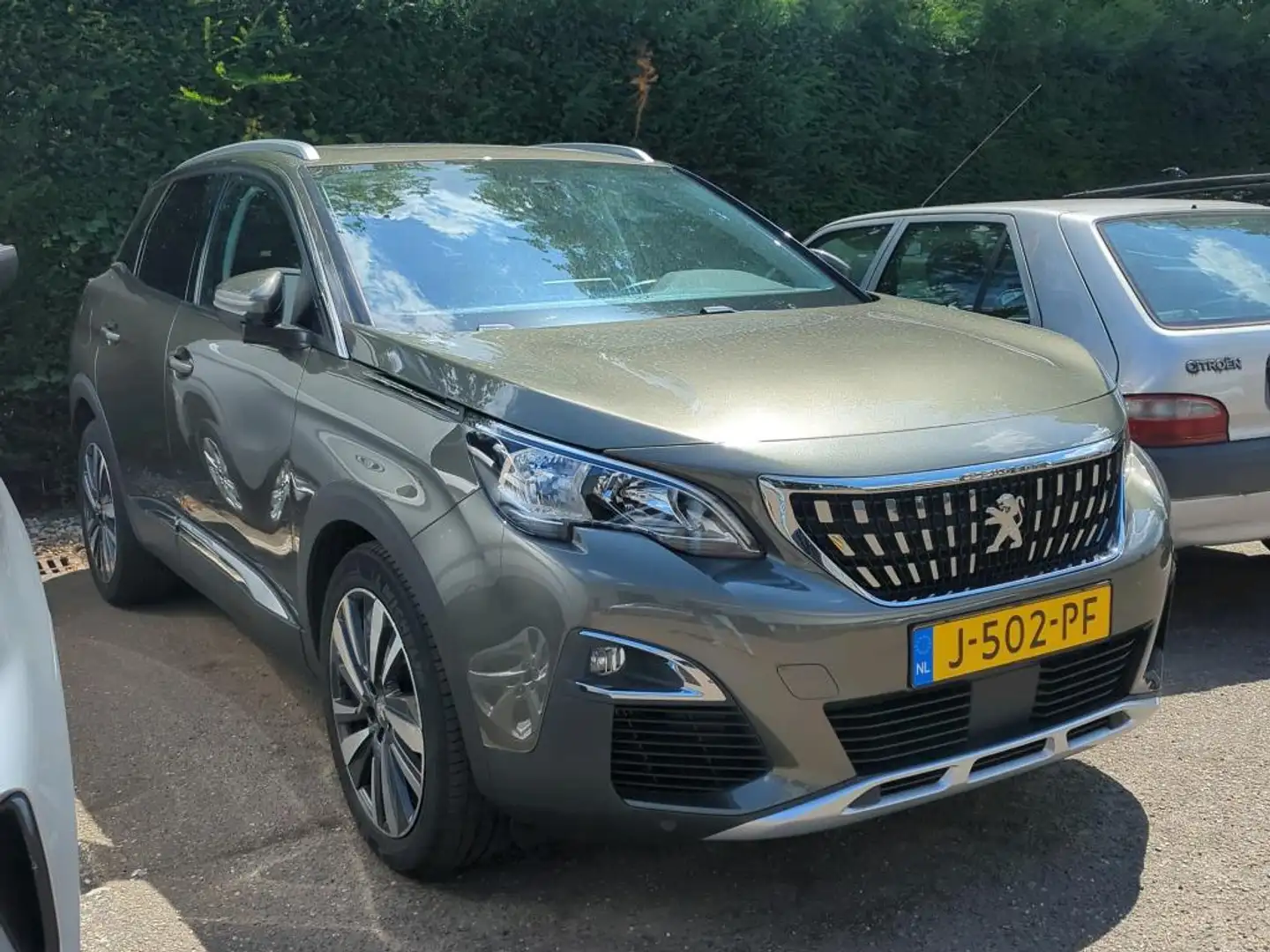 Peugeot 3008 1.2 PureTech Allure | Navigatie | Panorama/schuifd Grijs - 2