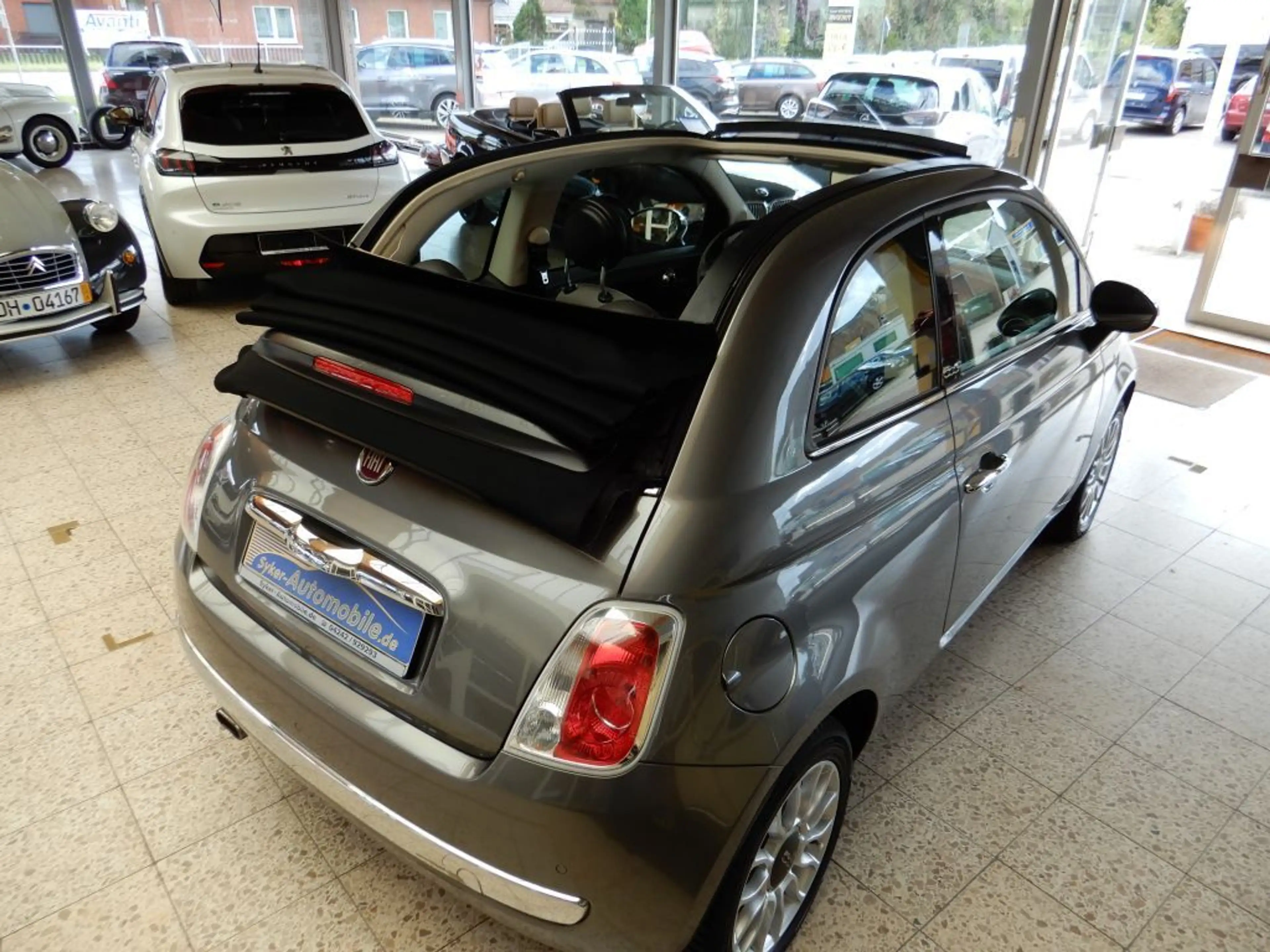 Fiat 500C 500 C 1.2 Lounge — photo 11
