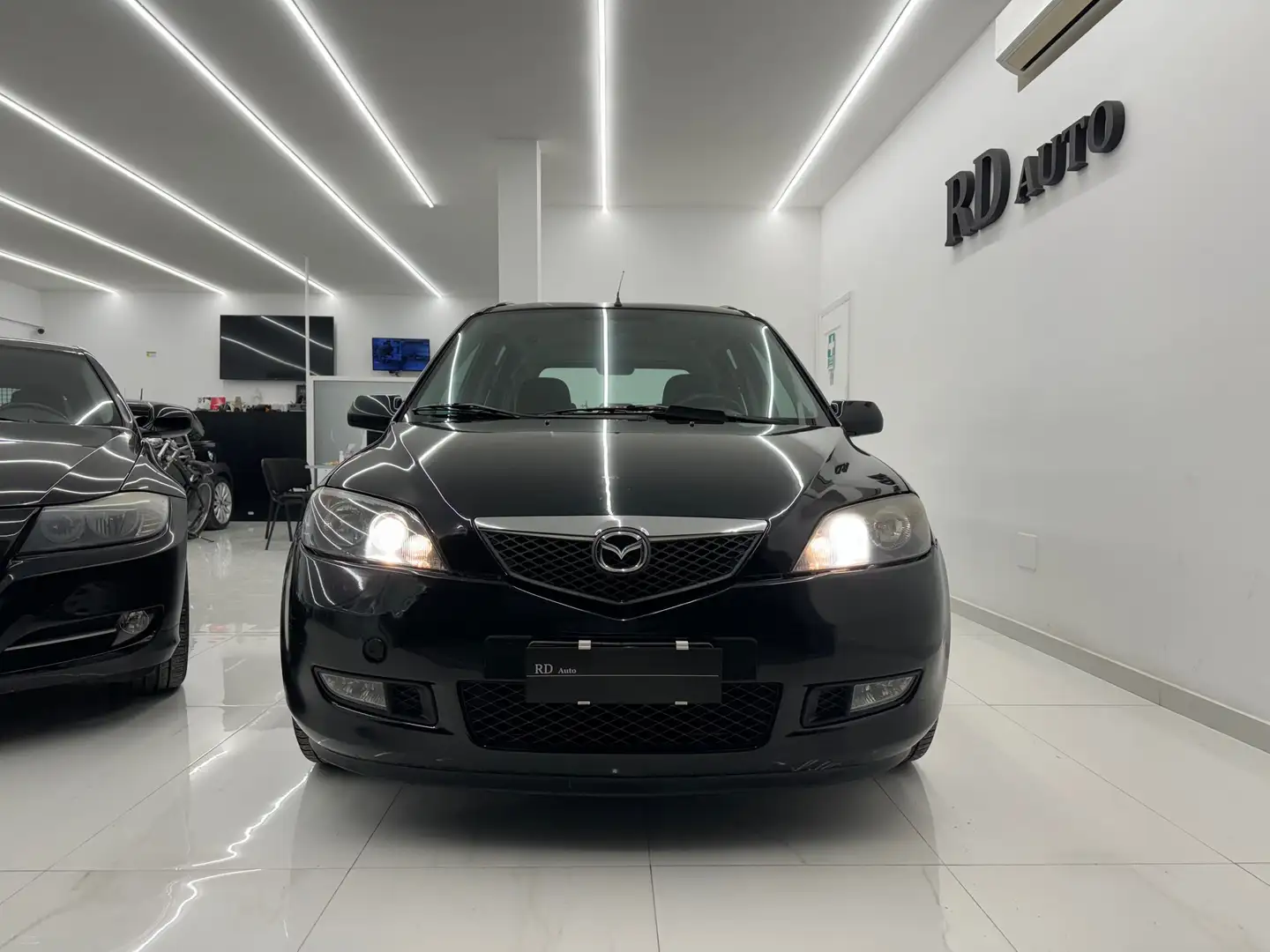 Mazda 2 1.4 td Cub 68cv okneopatentati Nero - 2