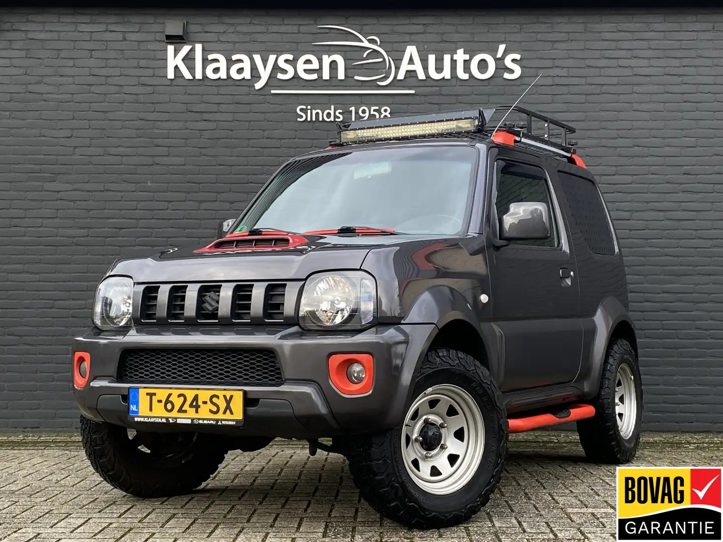 Suzuki Jimny 1.3 4WD Exclusive | leder interieur | airco | trek Grau - 1