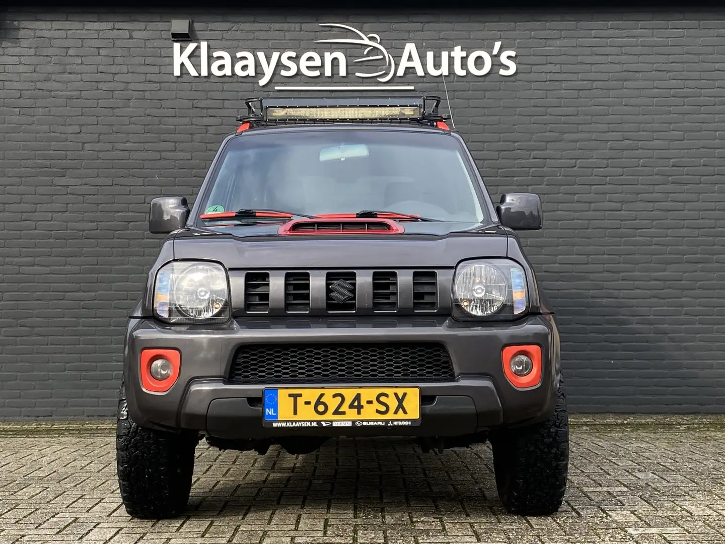 Suzuki Jimny 1.3 4WD Exclusive | leder interieur | airco | trek Grijs - 2