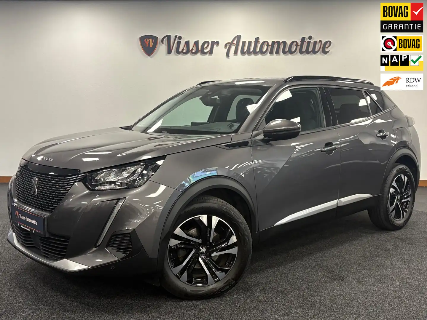 Peugeot 2008 1.2 PureTech Blue Lease Allure*Android Auto*Cruise Grijs - 1