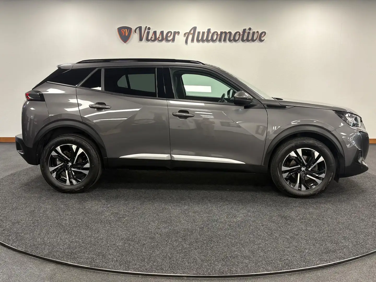 Peugeot 2008 1.2 PureTech Blue Lease Allure*Android Auto*Cruise Grijs - 2