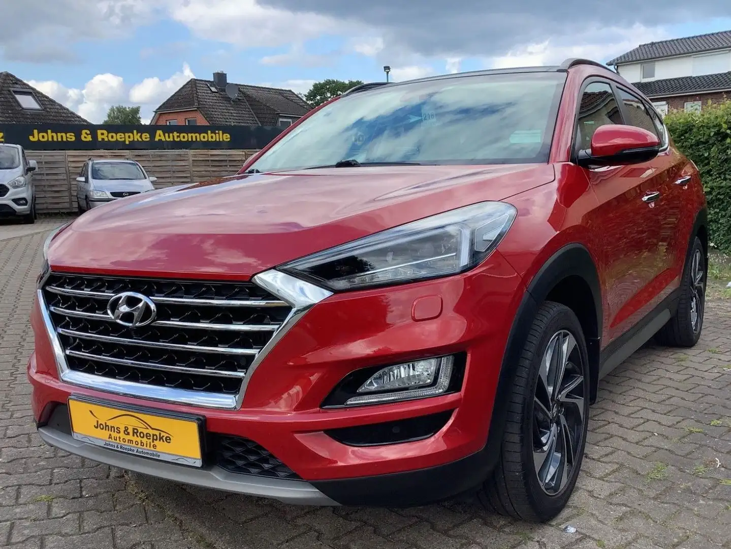Hyundai TUCSON 1,6 Automatik 4WD / AHK / NAVI / LEDER Rot - 1