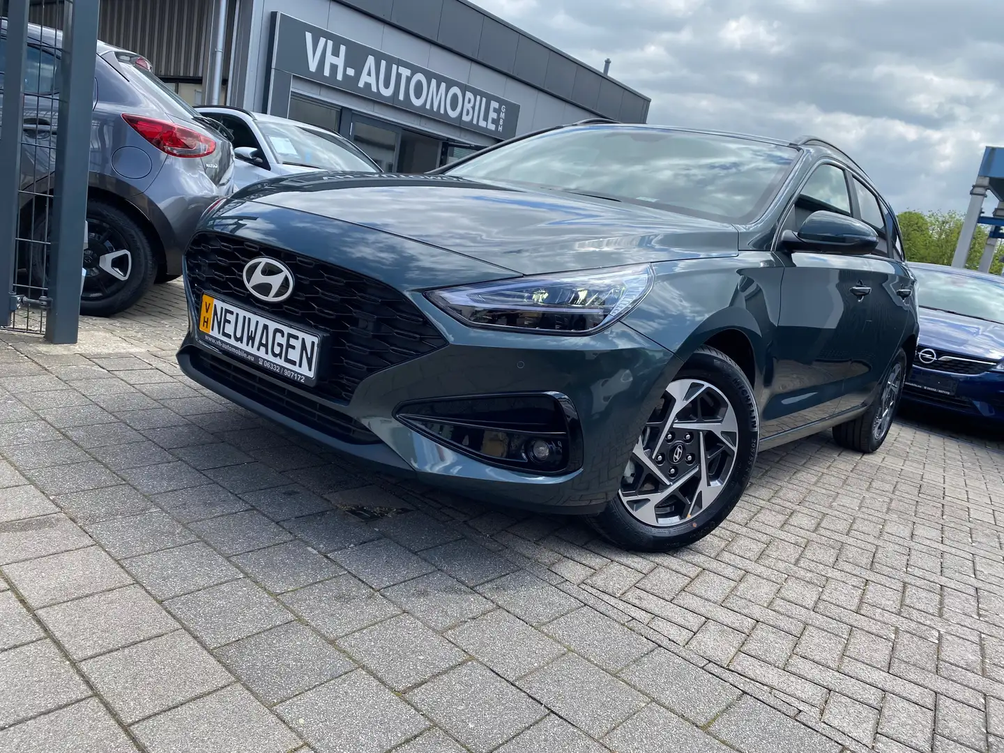 Hyundai i30 cw*NAVI*LED Frontsw*PDC vo&hi&R.KAMERA*WINTERPAKEt Grün - 2