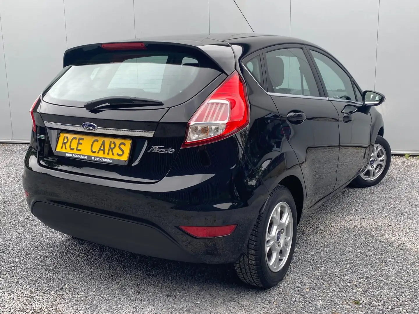 Ford Fiesta 1.0 EcoBoost D.A.B Xenon Clima Stoelverw Blueth KM Zwart - 2