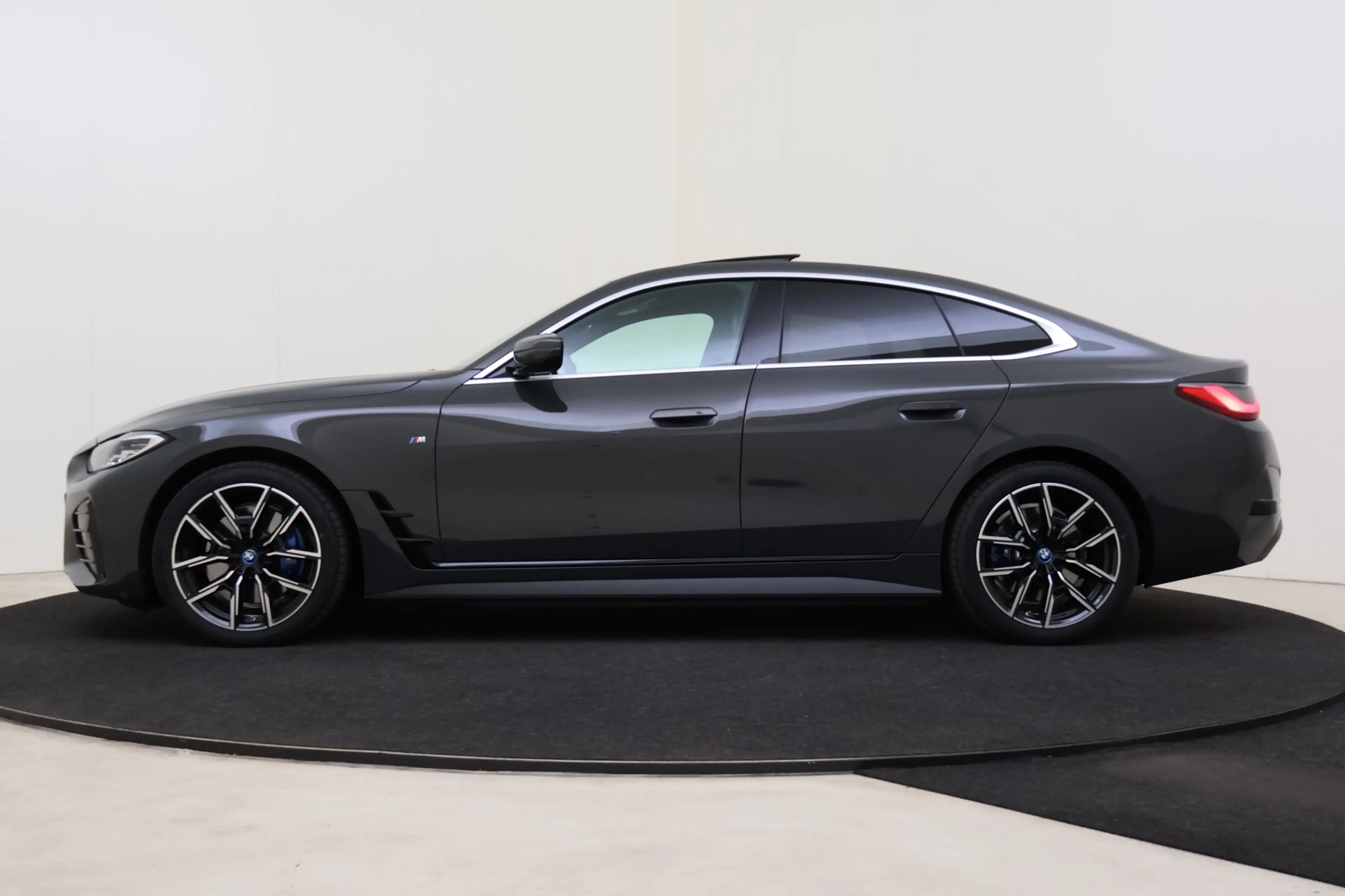 BMW i4 eDrive40 High Executive M Sport / Schuif-Kanteldak — photo 14