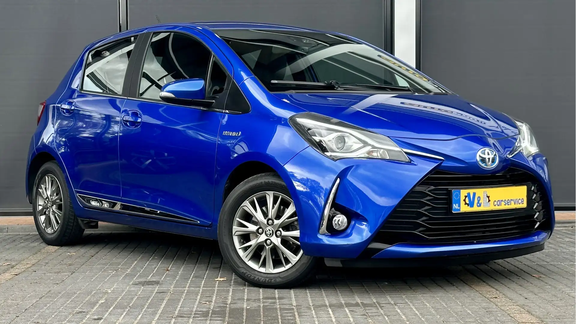 Toyota Yaris 1.5 Hybrid Executive / Camera / Cruise / Clima Blauw - 1