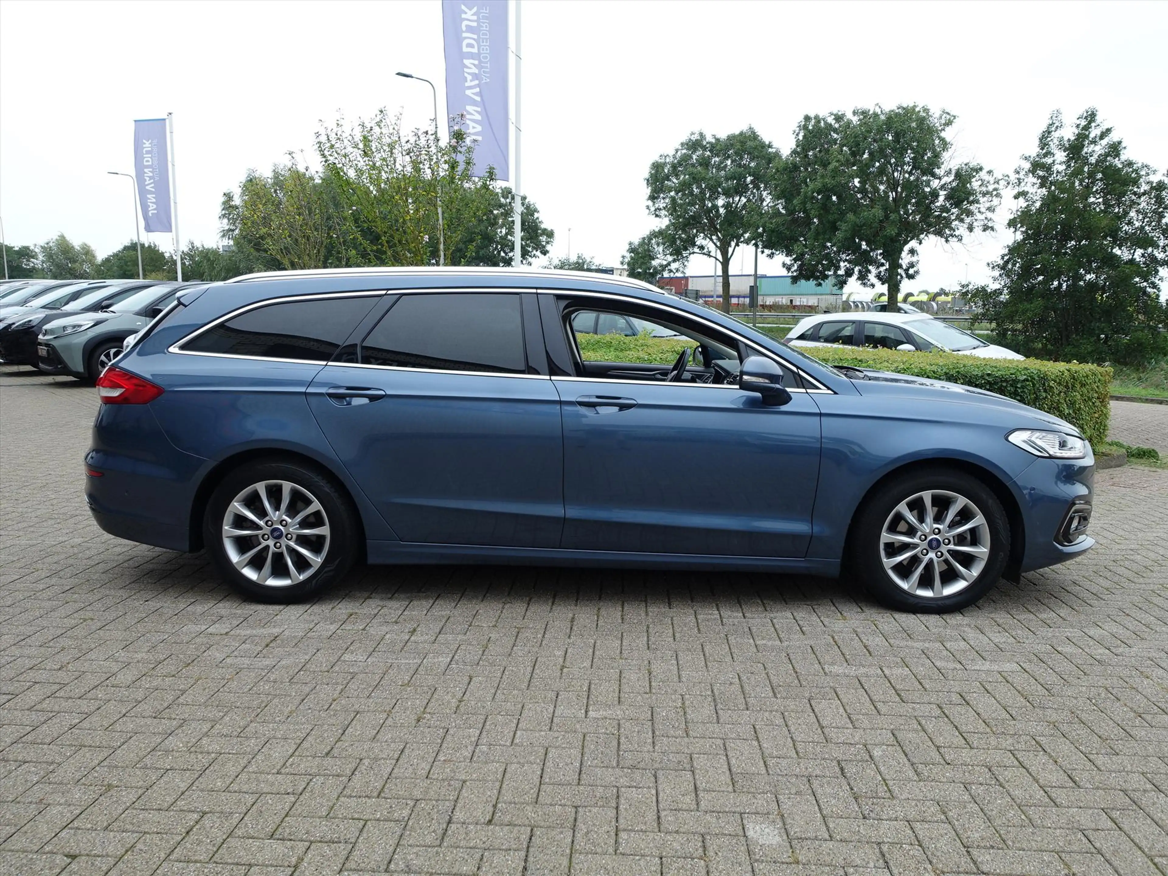 Ford Mondeo Wagon 2.0 HEV 187pk eCVT Titanium 4 Seizoenenbande — photo 6