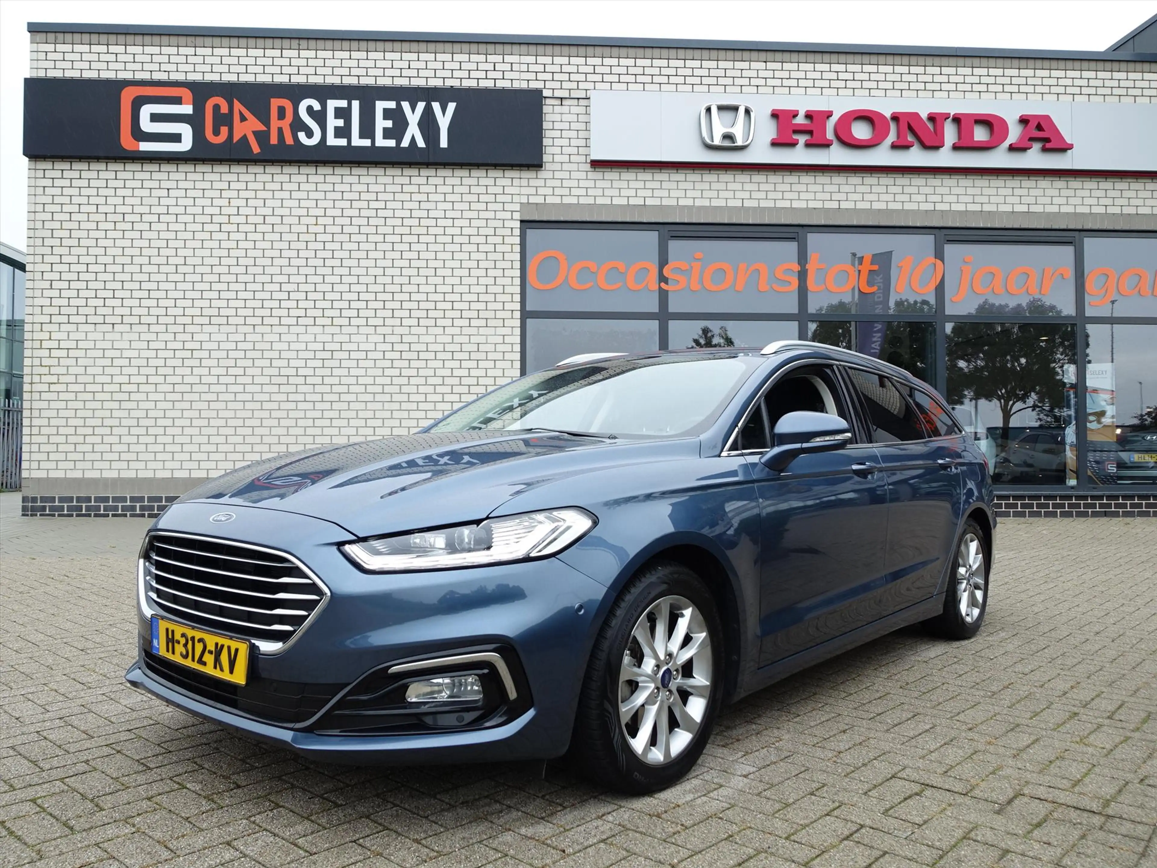 Ford Mondeo Wagon 2.0 HEV 187pk eCVT Titanium 4 Seizoenenbande