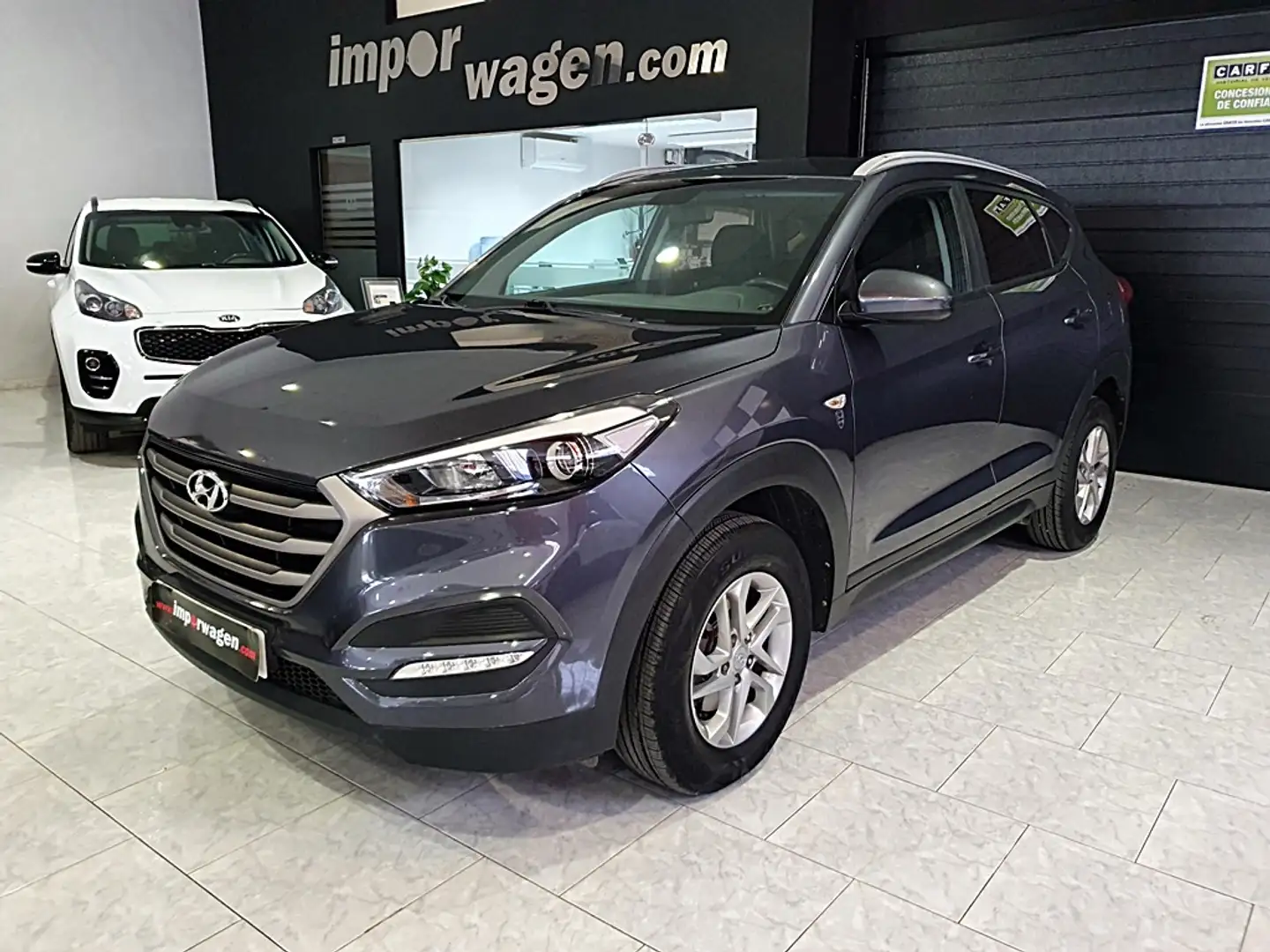 Hyundai TUCSON 1.6 GDI BD Klass 4x2 Grijs - 1