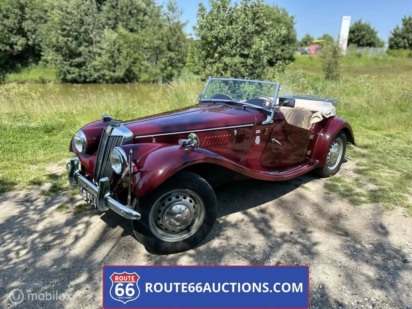 MG TF cabriolet | Route 66 Auctions Rouge - 1